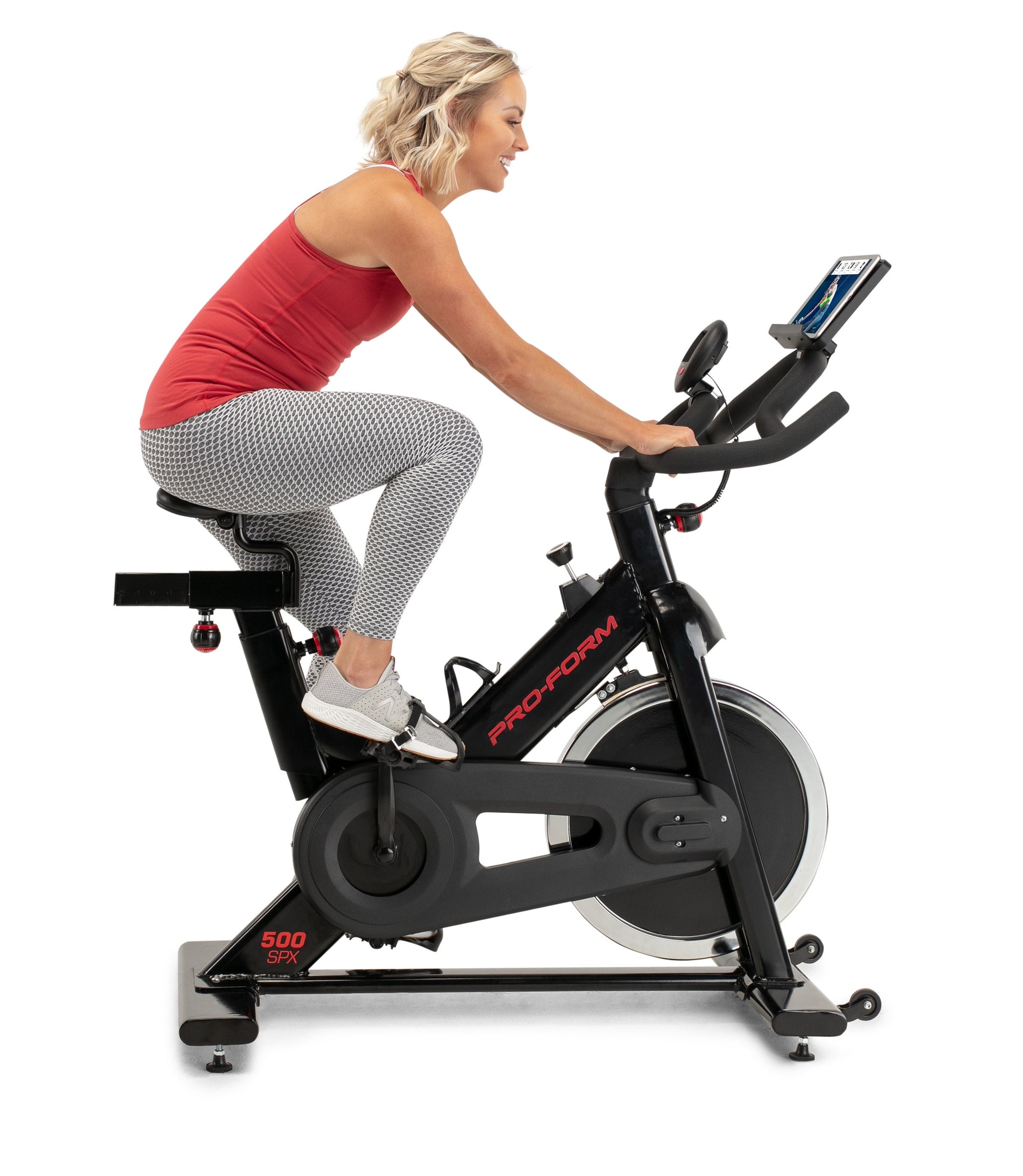 Rev Up Your Workout with the 500 SPX Indoor Cycle Featuring an Adjustable Racing Seat!