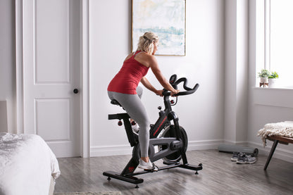 Rev Up Your Workout with the 500 SPX Indoor Cycle Featuring an Adjustable Racing Seat!